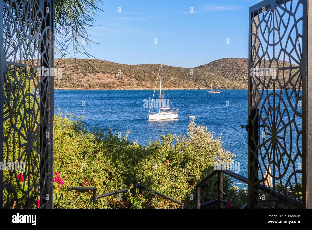 Beautiful Mediterranean coast with islands, mountains and yachts in the blue sea Stock Photo