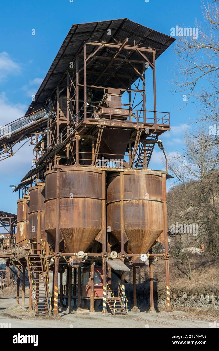 An old gravel quarry. Mining and quarrying equipment. Granite gravel