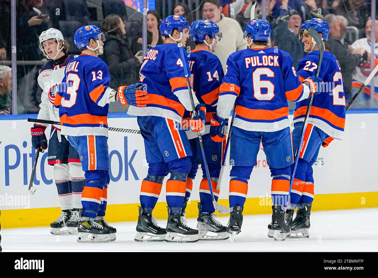 New York Islanders players celebrate after a goal during the third ...