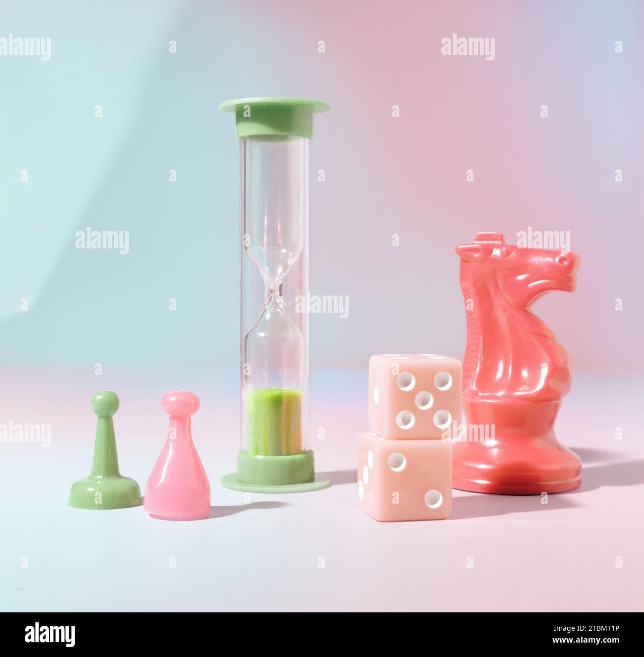 Dice, A Pink Knight Chess Piece, Board Game Pieces, Gaming Pawns and a