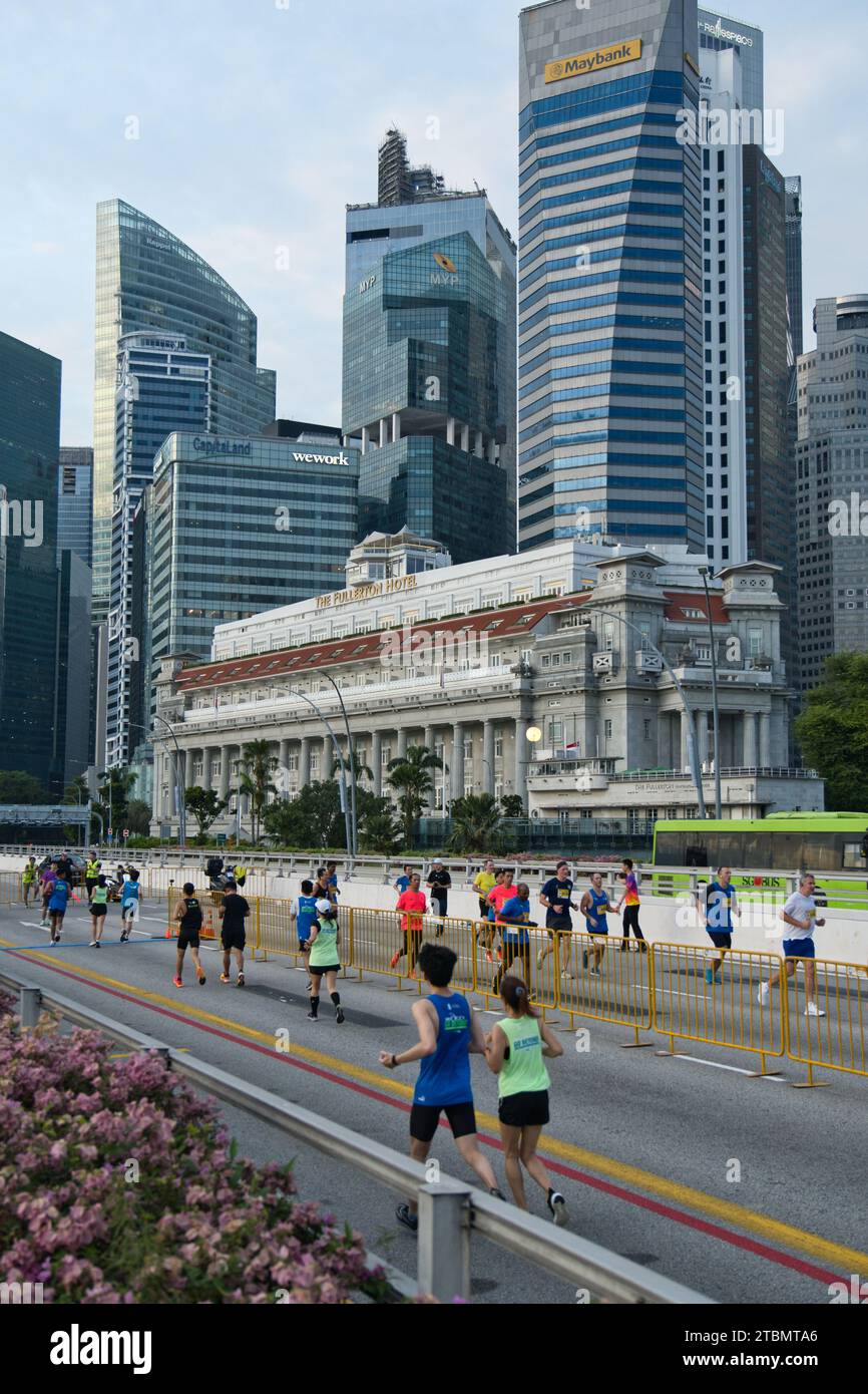 Singapore Dec 2, 2023 Runners on the Esplanade Bridge during the