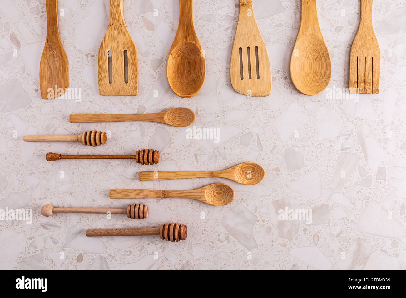 different kitchenware on a light background top view. Cooking ...