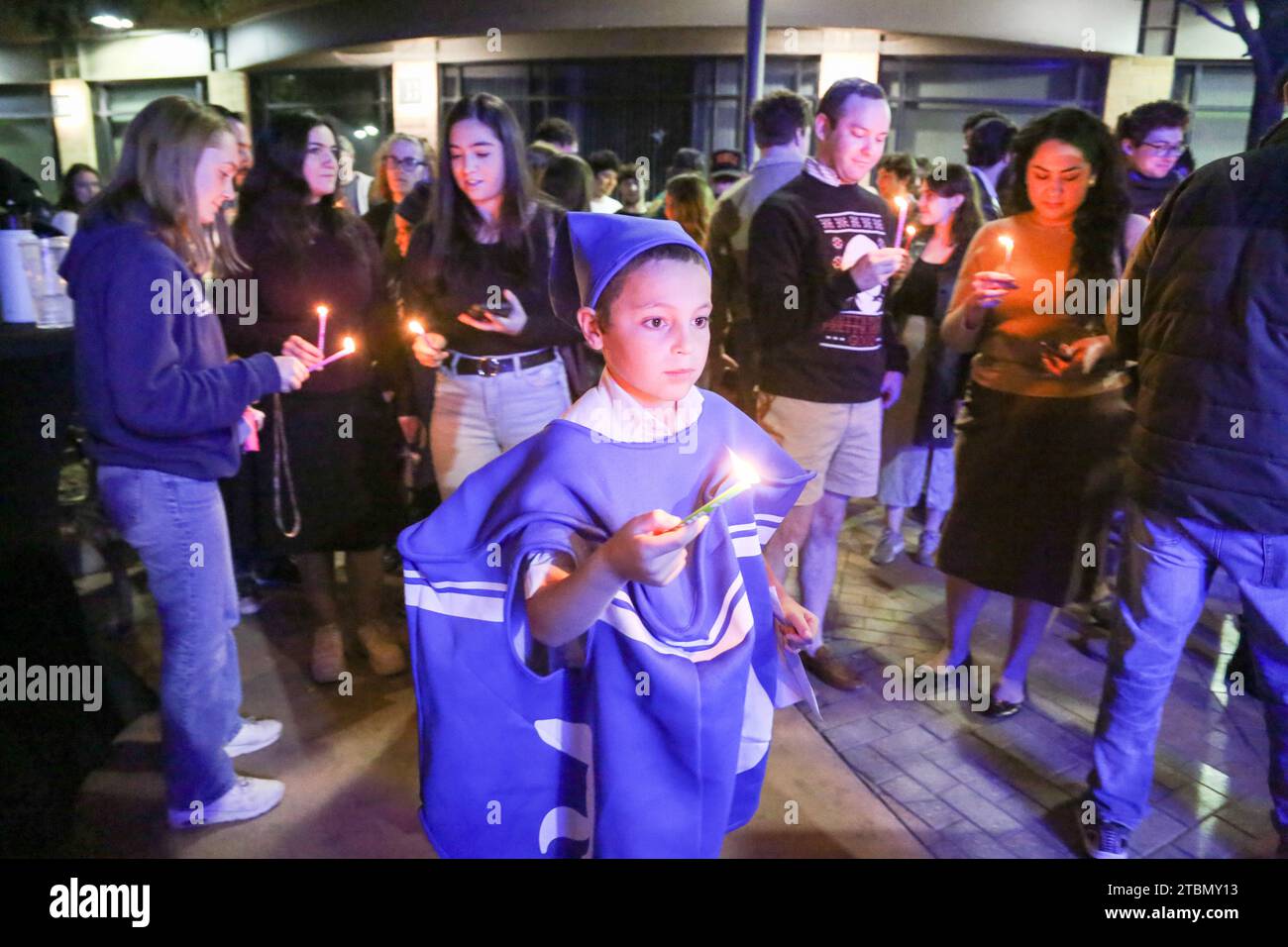 Candles are lit so that they can be passed around to the crowd that