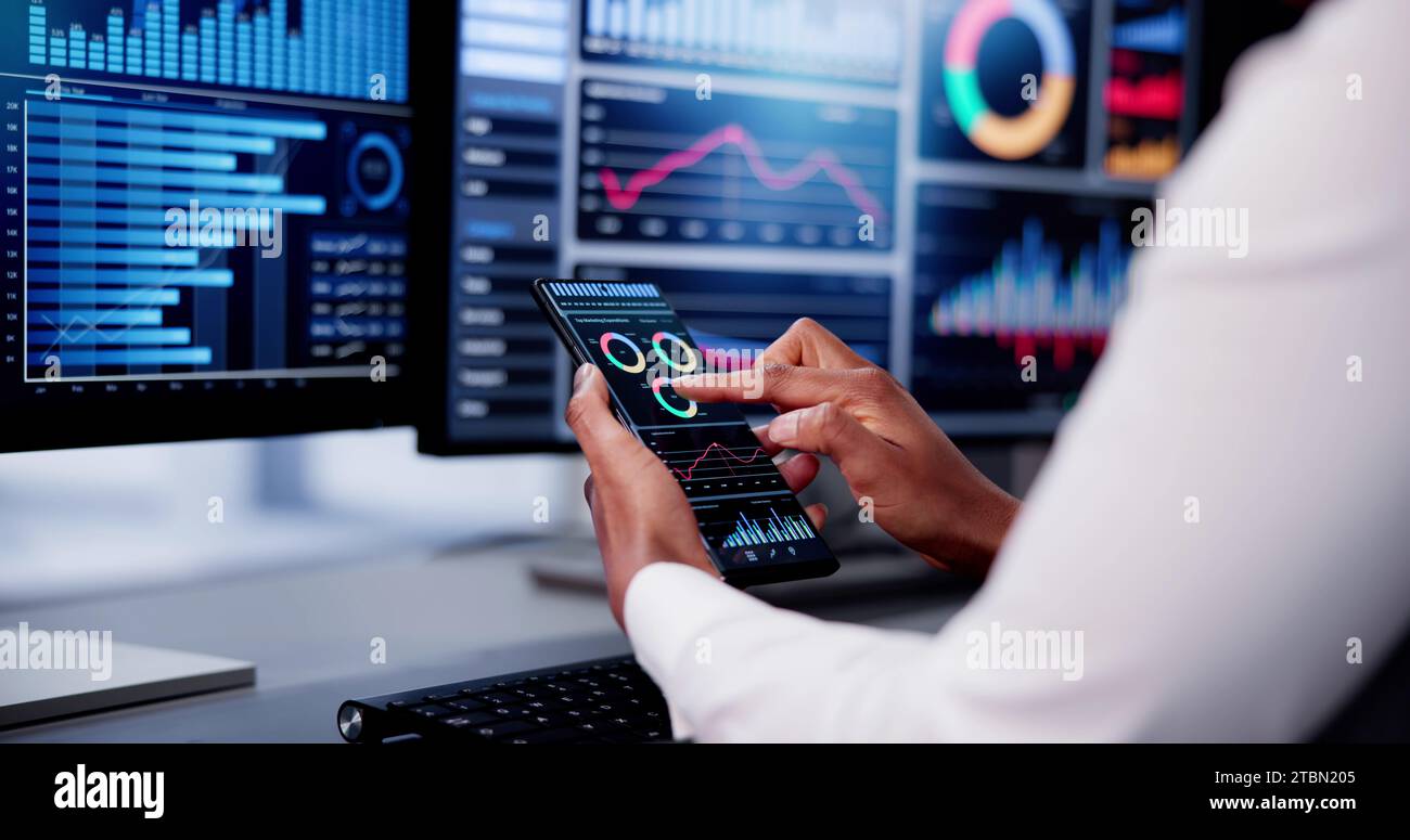 African Advisor Using KPI Dashboard With Financial Analytics Graphs Stock Photo