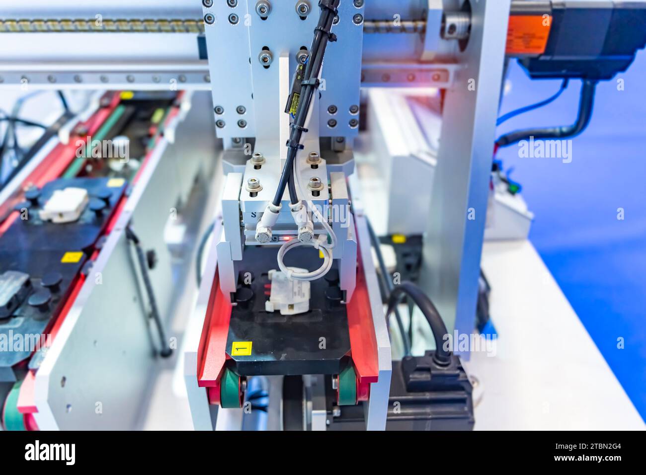 robot arm machine tool at industrial manufacture plant,Smart factory industry 4.0 concept. Stock Photo
