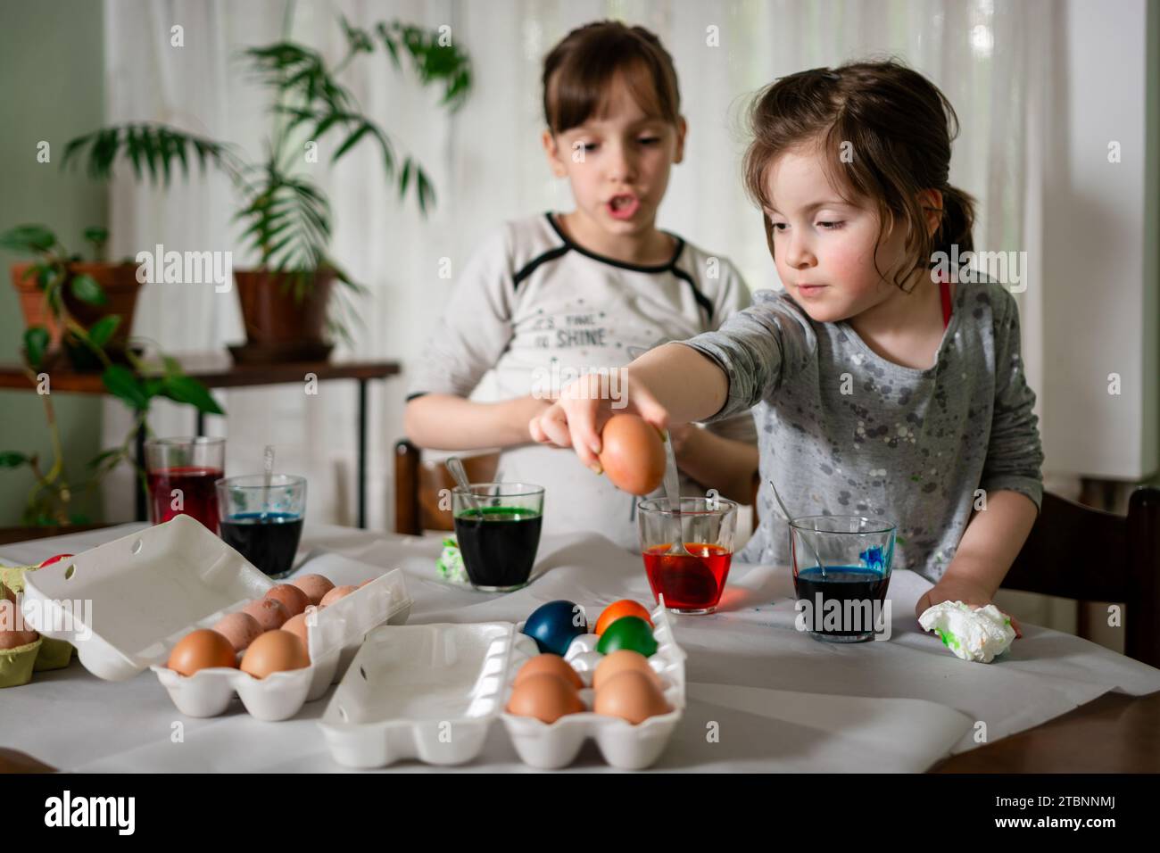 Toddler painting at home Stock Photo - Alamy