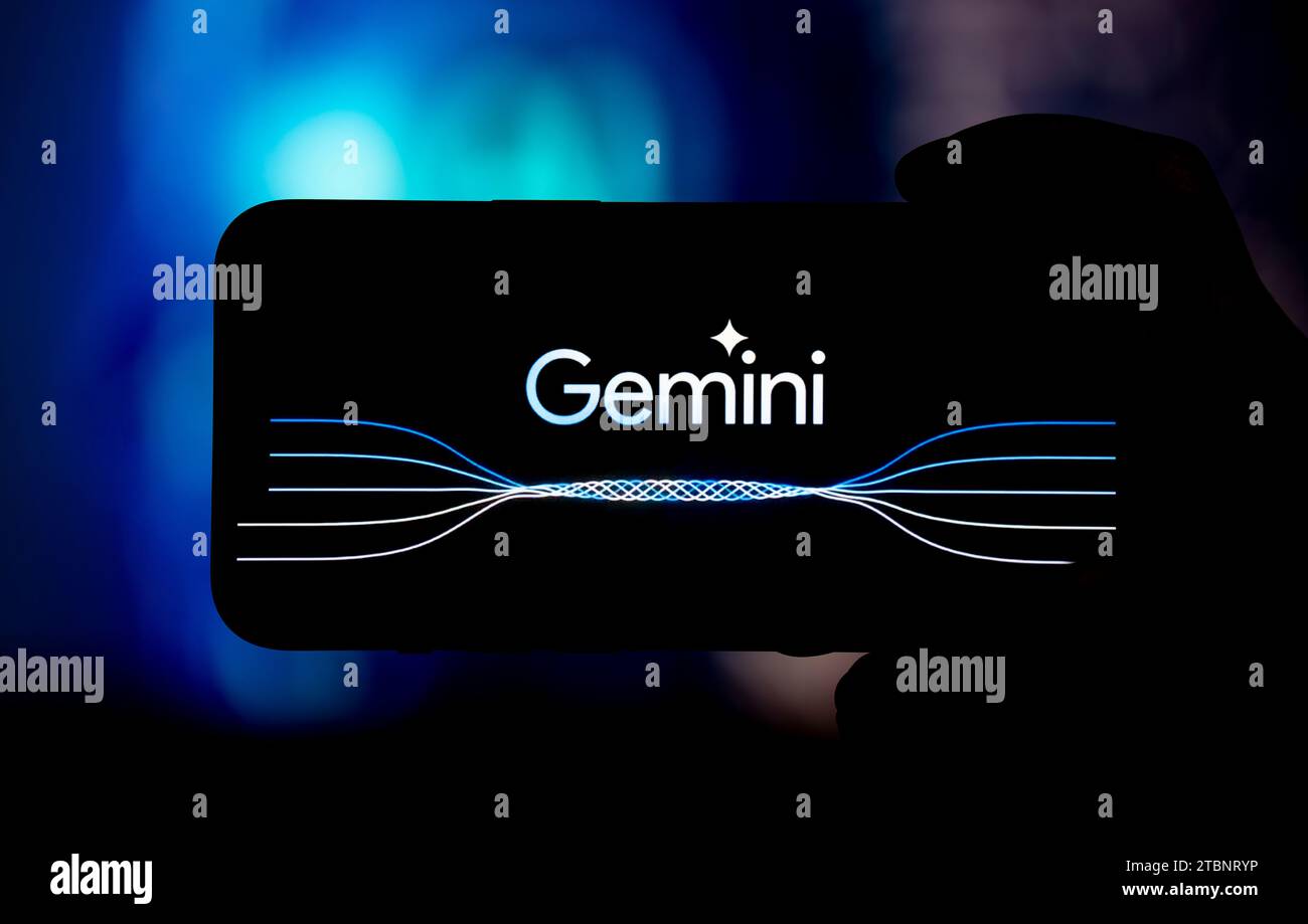 December 8, 2023: Guwahati, India. 8 December 2023. In this photo illustration a Gemini logo is displayed on a smartphone with Artificial Intelligence symbol in the background. (Credit Image: © David Talukdar/ZUMA Press Wire) EDITORIAL USAGE ONLY! Not for Commercial USAGE! Stock Photo