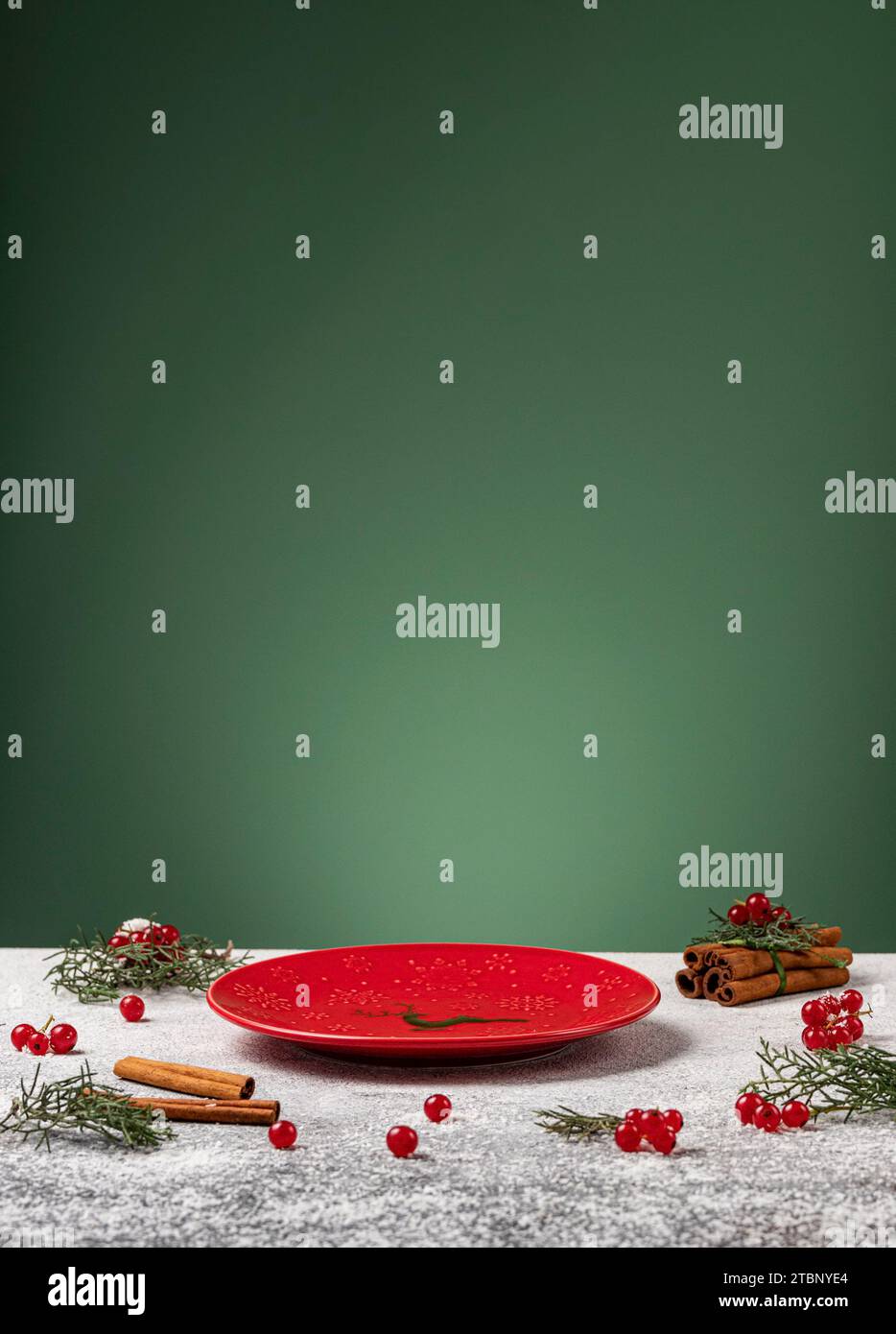 Empty red plate on Christmas setting background Stock Photo