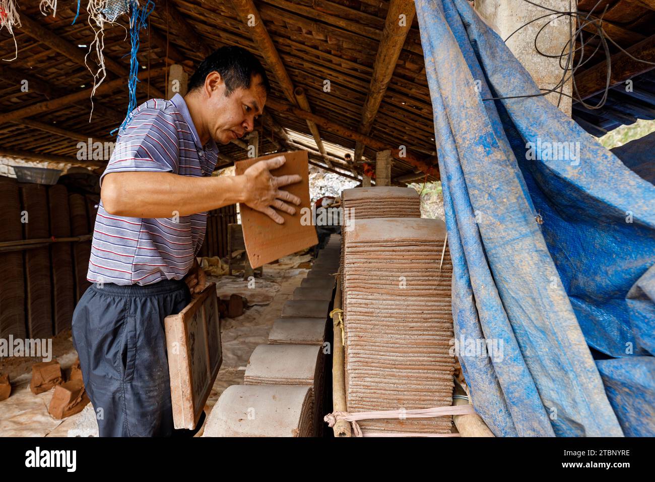 Tiles are handmade in Bac Son in Vietnam Stock Photo