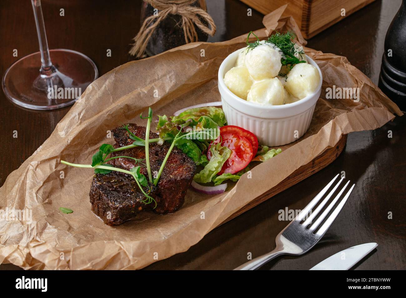 Baked beef with vegetables (carrots, peas, potatoes), horizontal Stock Photo