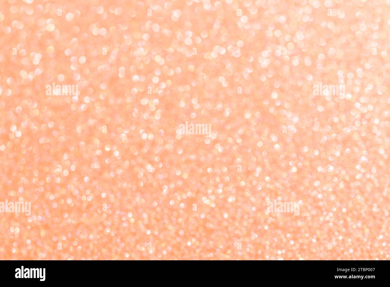 Color of the Year 2024 Peach Fuzz Abstract background. Glitter texture