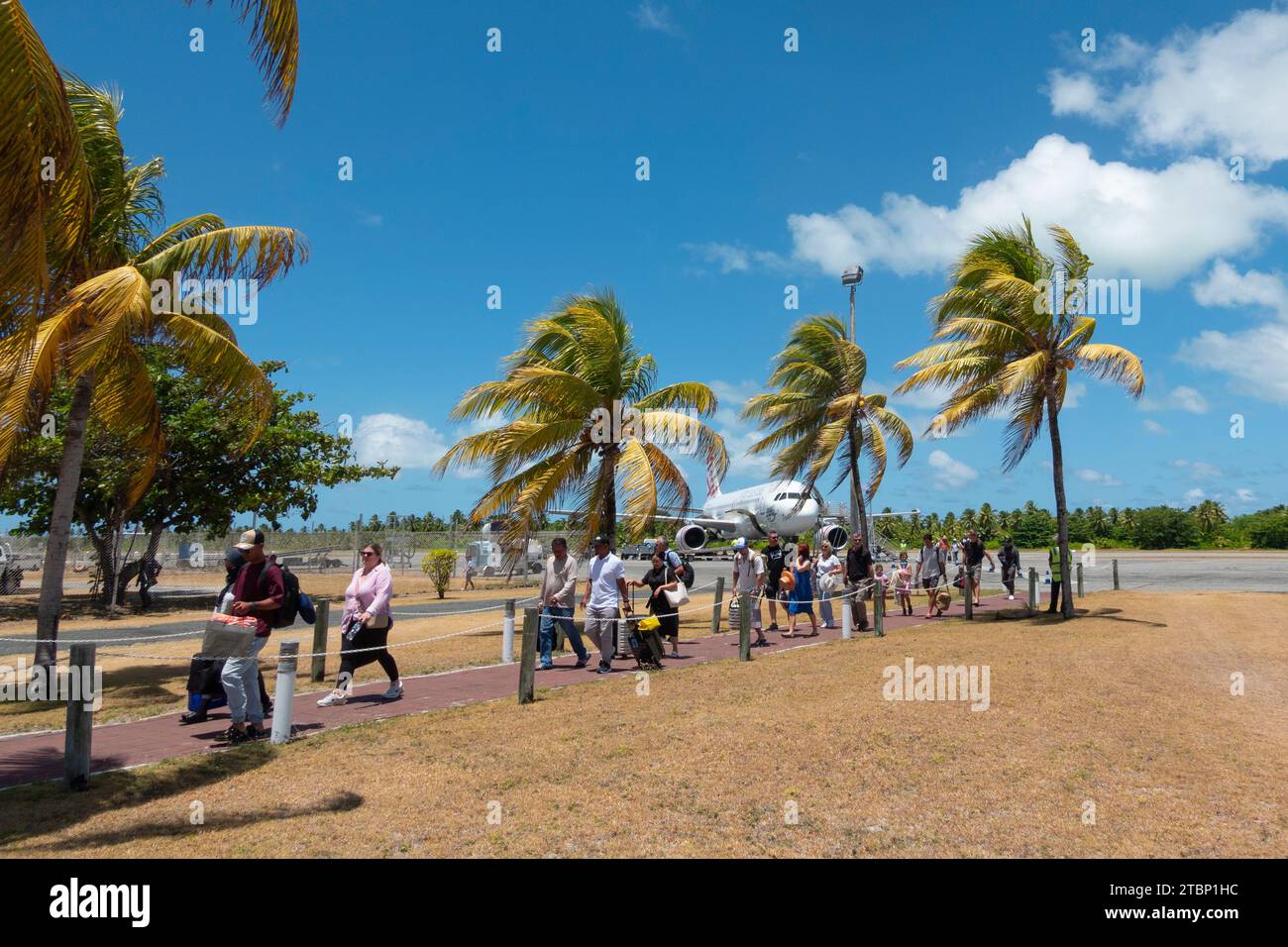 Passengers disembarking from a Virgin Australia flight at Cocos