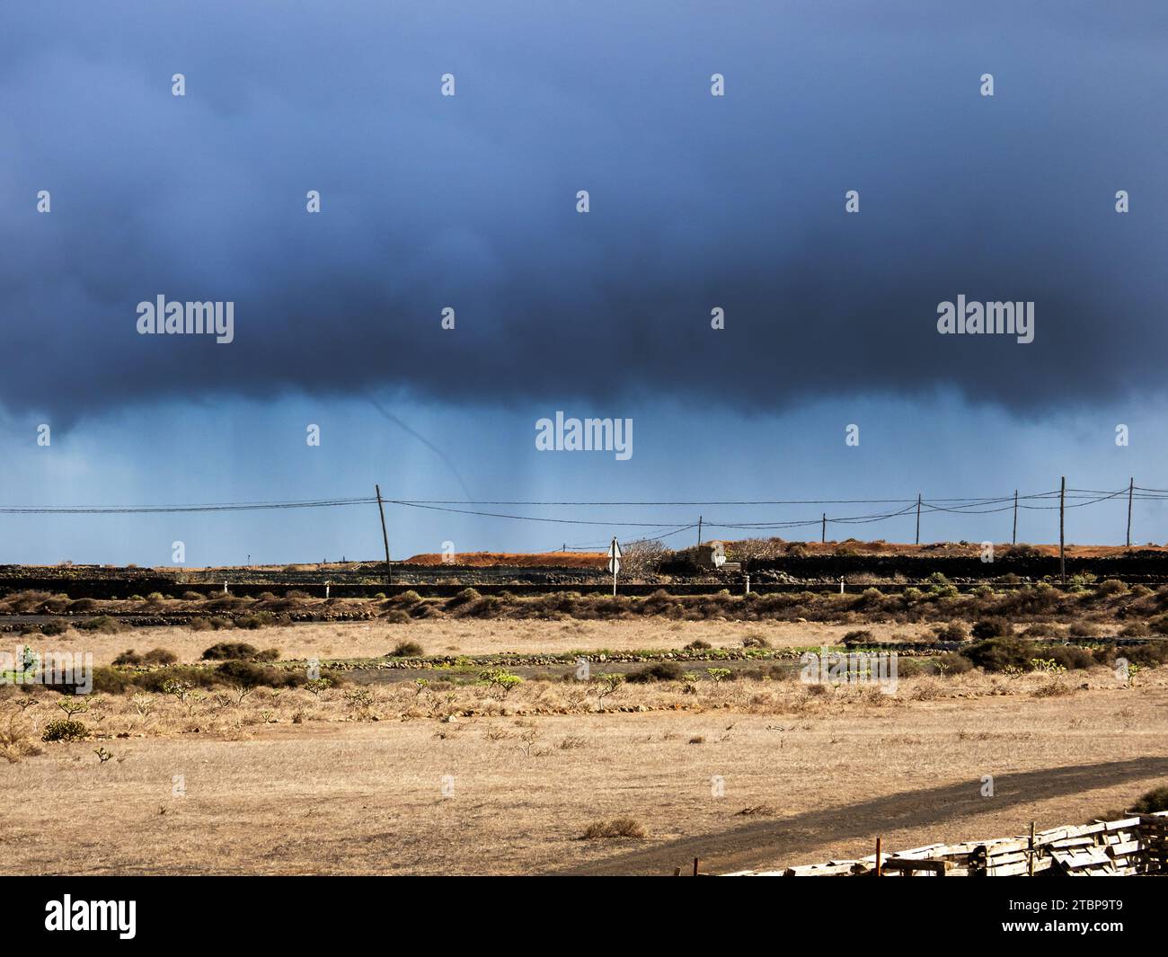 A tornado over the coast from Teguise on Lanzarote, Canary Islands. Stock Photo