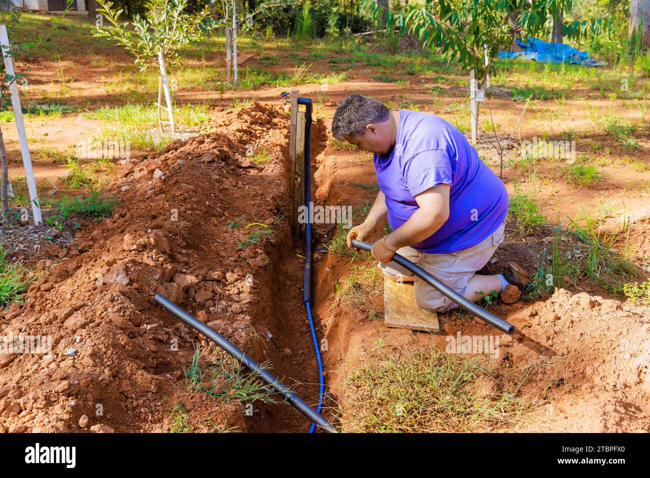 Underground PVC water pipe is thermally insulated with PE foam coated