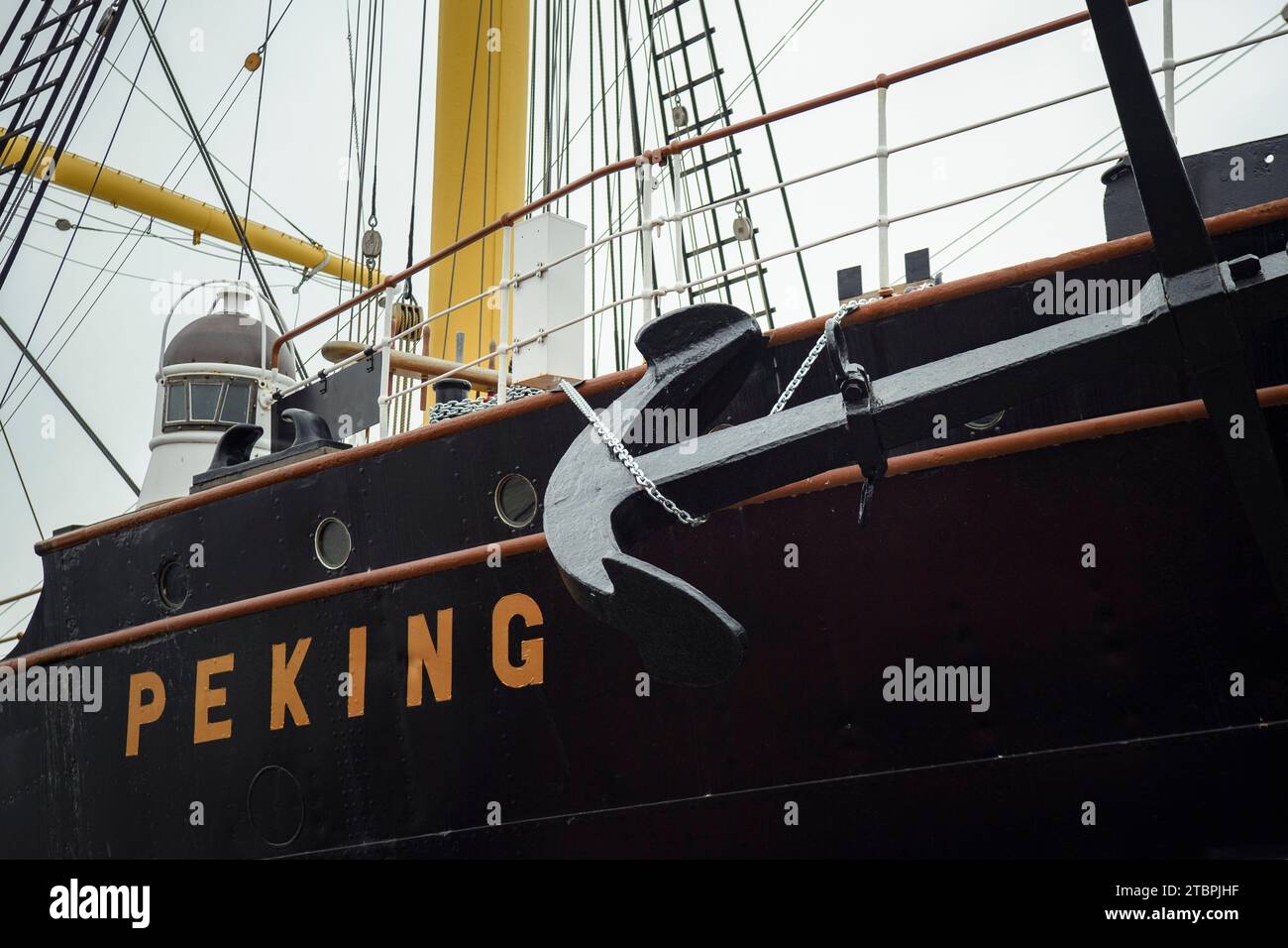 Hamburg, Germany. 08th Dec, 2023. The newly attached anchor of the four-masted barque and museum ship 'Peking' can be seen next to the name lettering on the hull in the museum harbor in Hamburg. The anchor comes from the sister ship 'Pamir', which sank in 1957. Credit: Gregor Fischer/dpa/Alamy Live News Stock Photo