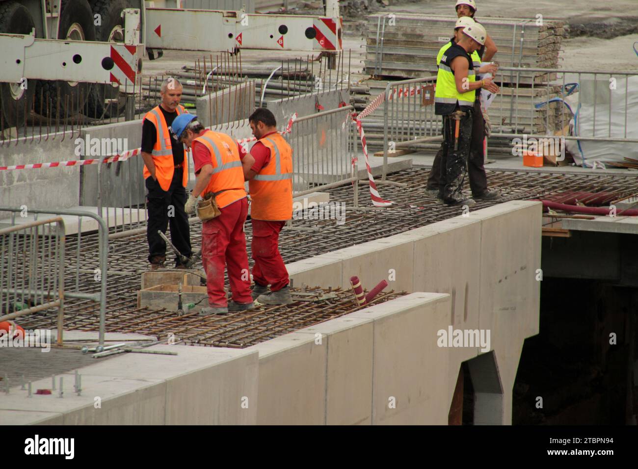 Construction workers wearing orange hi-res stock photography and images ...