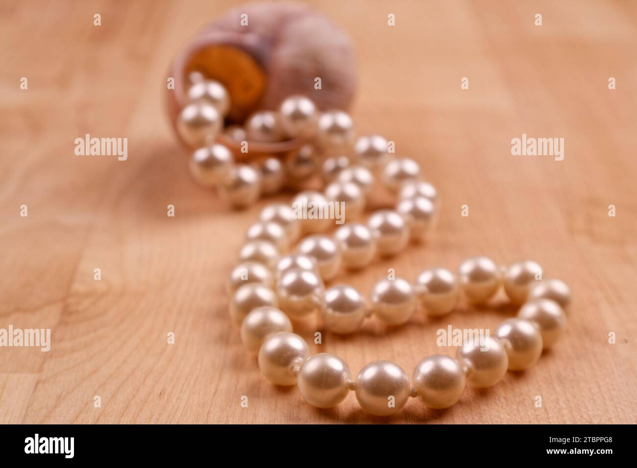 a string of fake pearls Stock Photo - Alamy