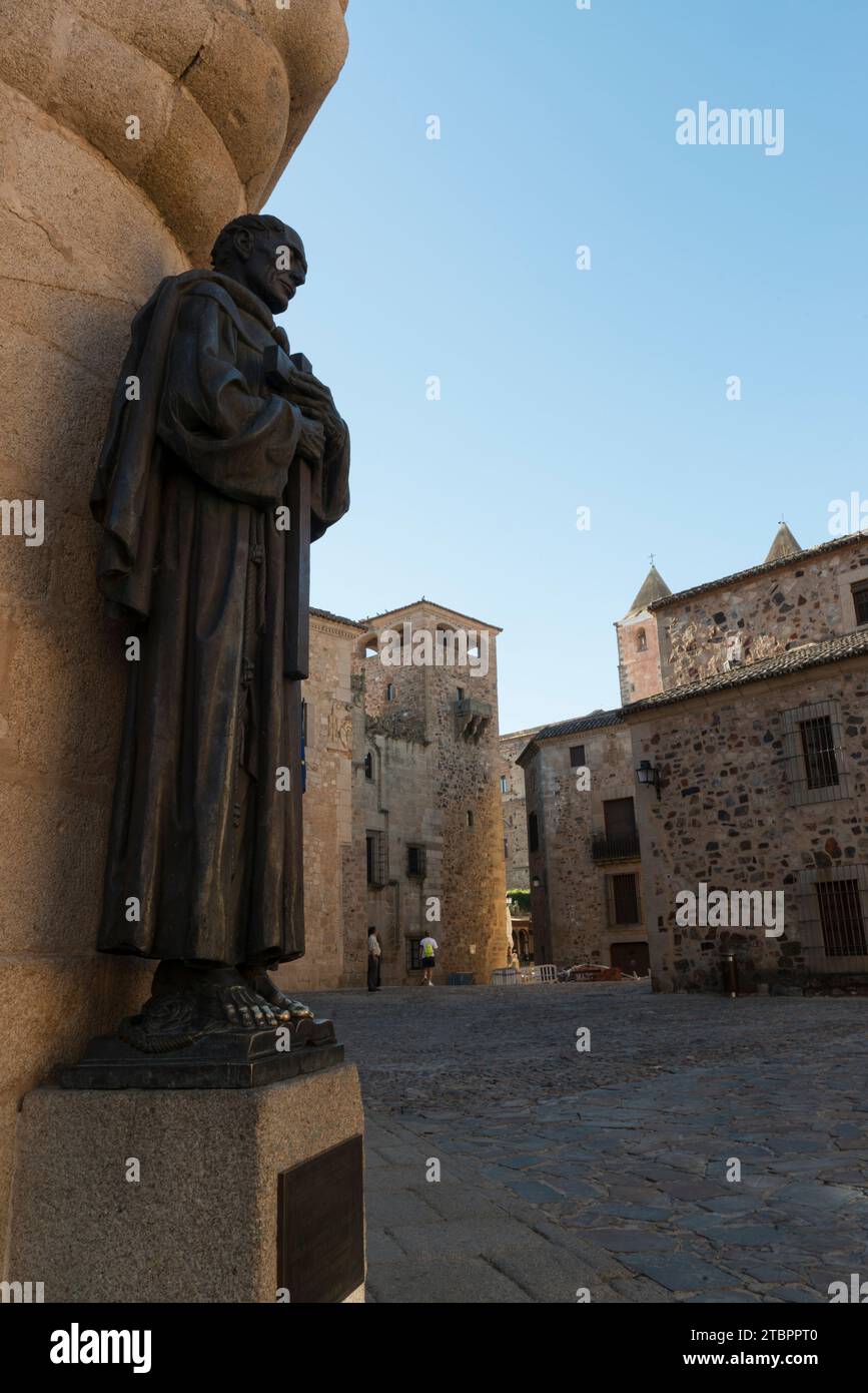 Statue of San Pedro de Alcantara on the outside corner of the Cathedral of Santa Maria at the Plaza de Santa Maria. Caceres, Extremadura, Spain Stock Photo