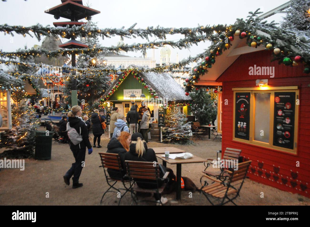 Copenhagen, Denmark /08 December 2023/.Christmas in tivoli garden from 19 nov.2023 untill 31 dec.2023 christmas visitors and christmas shoppers enjoy  looking at christmas decorations in tivoli garden in danish capital.    (Photo.Francis Joseph Dean/Dean Pictures) Stock Photo