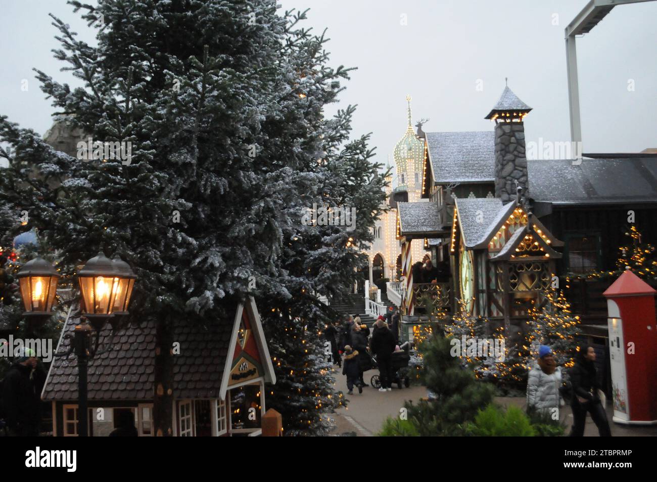 Copenhagen, Denmark /08 December 2023/.Christmas in tivoli garden from 19 nov.2023 untill 31 dec.2023 christmas visitors and christmas shoppers enjoy  looking at christmas decorations in tivoli garden in danish capital.    (Photo.Francis Joseph Dean/Dean Pictures) Stock Photo