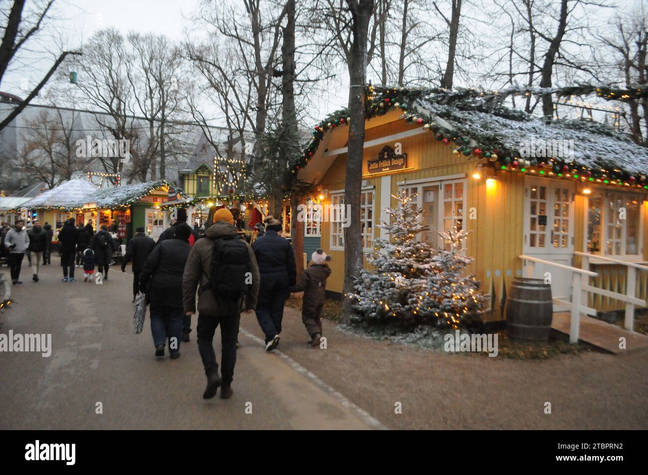 Copenhagen, Denmark /08 December 2023/.Christmas in tivoli garden from 19 nov.2023 untill 31 dec.2023 christmas visitors and christmas shoppers enjoy  looking at christmas decorations in tivoli garden in danish capital.    (Photo.Francis Joseph Dean/Dean Pictures) Stock Photo