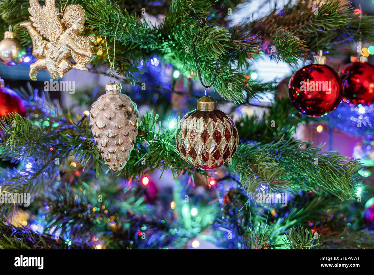 Christmas tree decorated with balls and gerland Stock Photo - Alamy