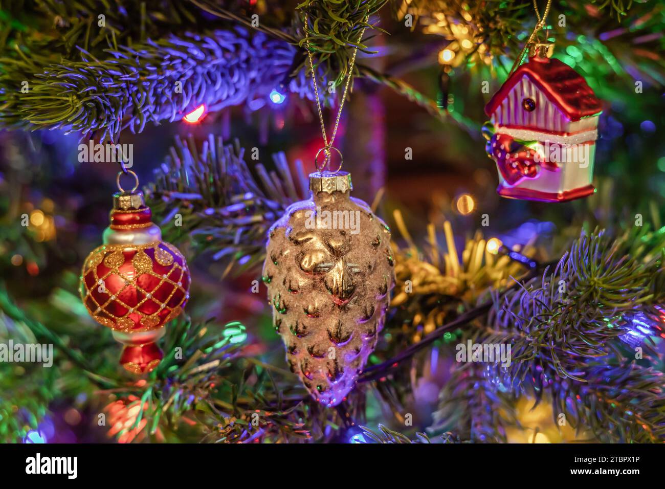 Christmas tree decorated with balls and gerland Stock Photo - Alamy