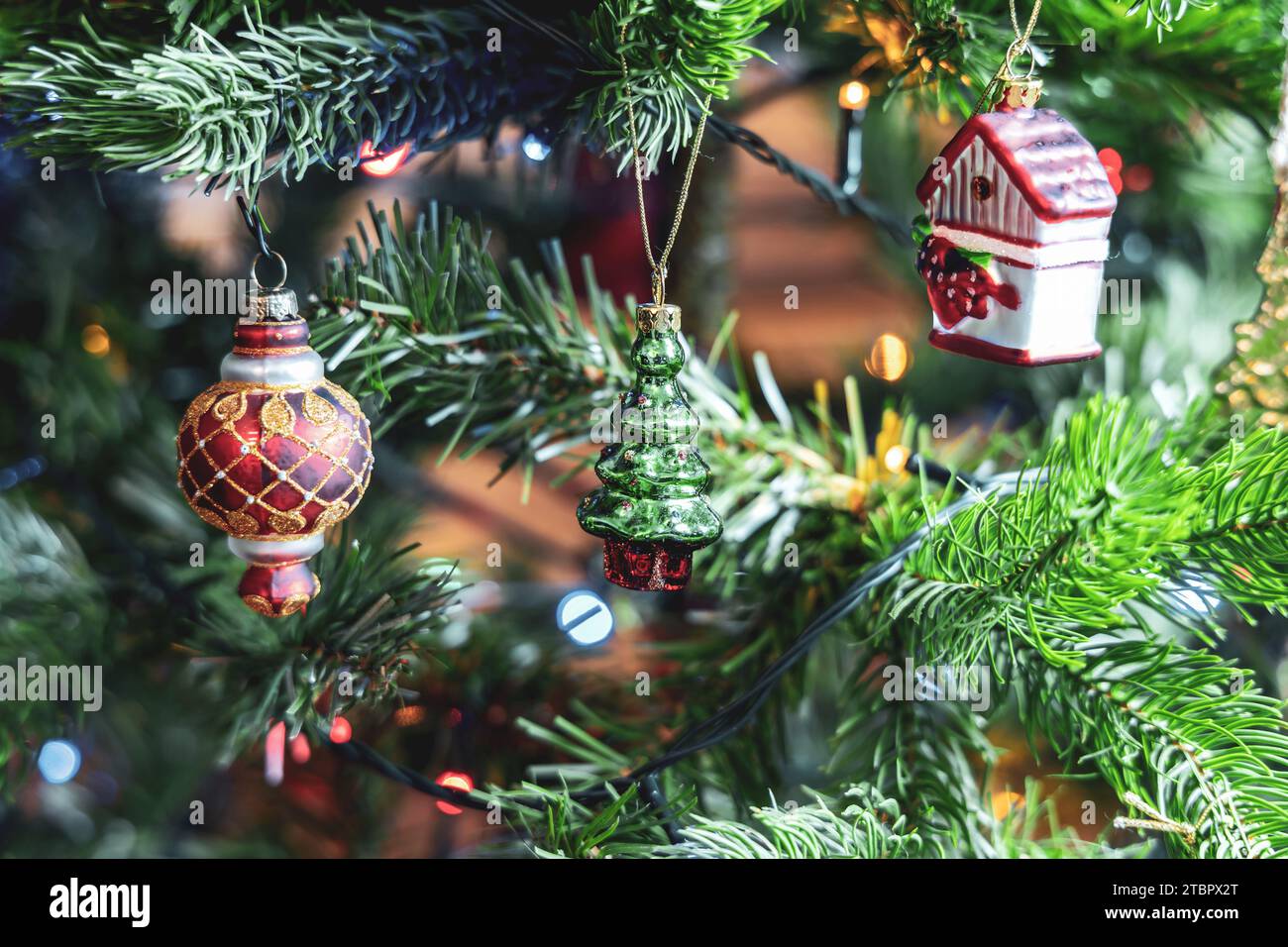 Christmas tree decorated with balls and gerland Stock Photo - Alamy