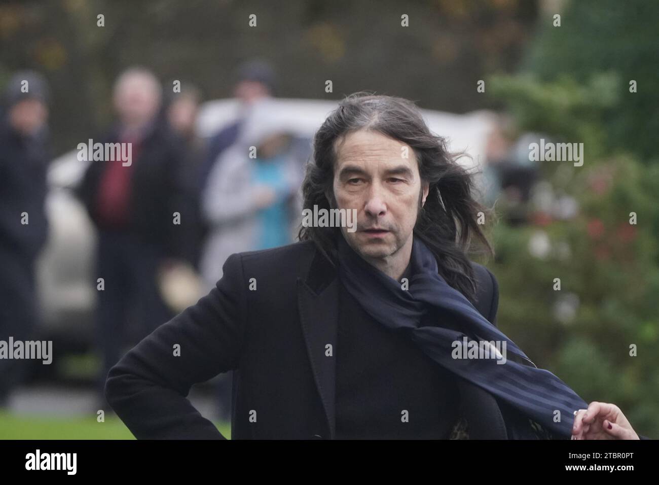 Bobby Gillespie arrives for the funeral of Shane MacGowan at Saint Mary's of the Rosary Church, Nenagh, Co. Tipperary. MacGowan, who found fame as the lead singer of London-Irish punk/folk band The Pogues, died at the age of 65 last week. Picture date: Friday December 8, 2023. Stock Photo