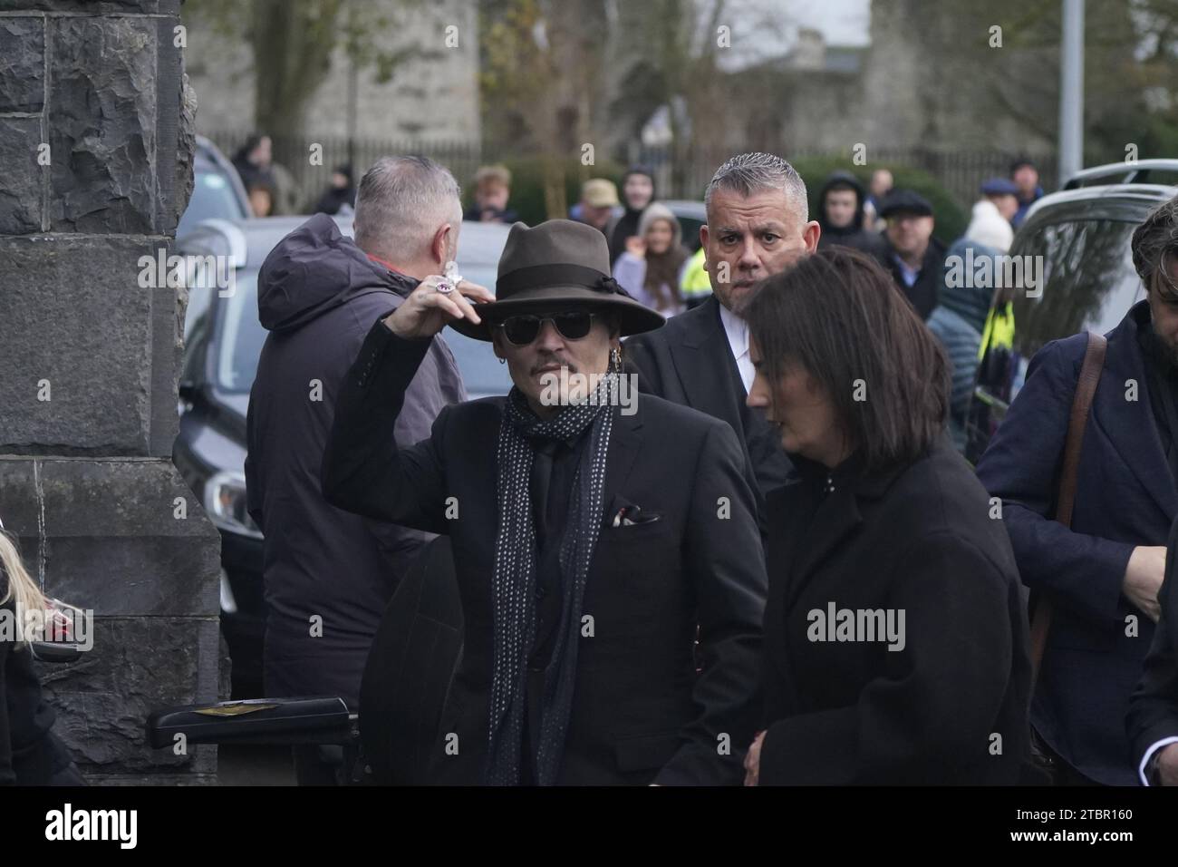 Johnny Depp arrives for the funeral of Shane MacGowan at Saint Mary's of the Rosary Church, Nenagh, Co. Tipperary. MacGowan, who found fame as the lead singer of London-Irish punk/folk band The Pogues, died at the age of 65 last week. Picture date: Friday December 8, 2023. Stock Photo