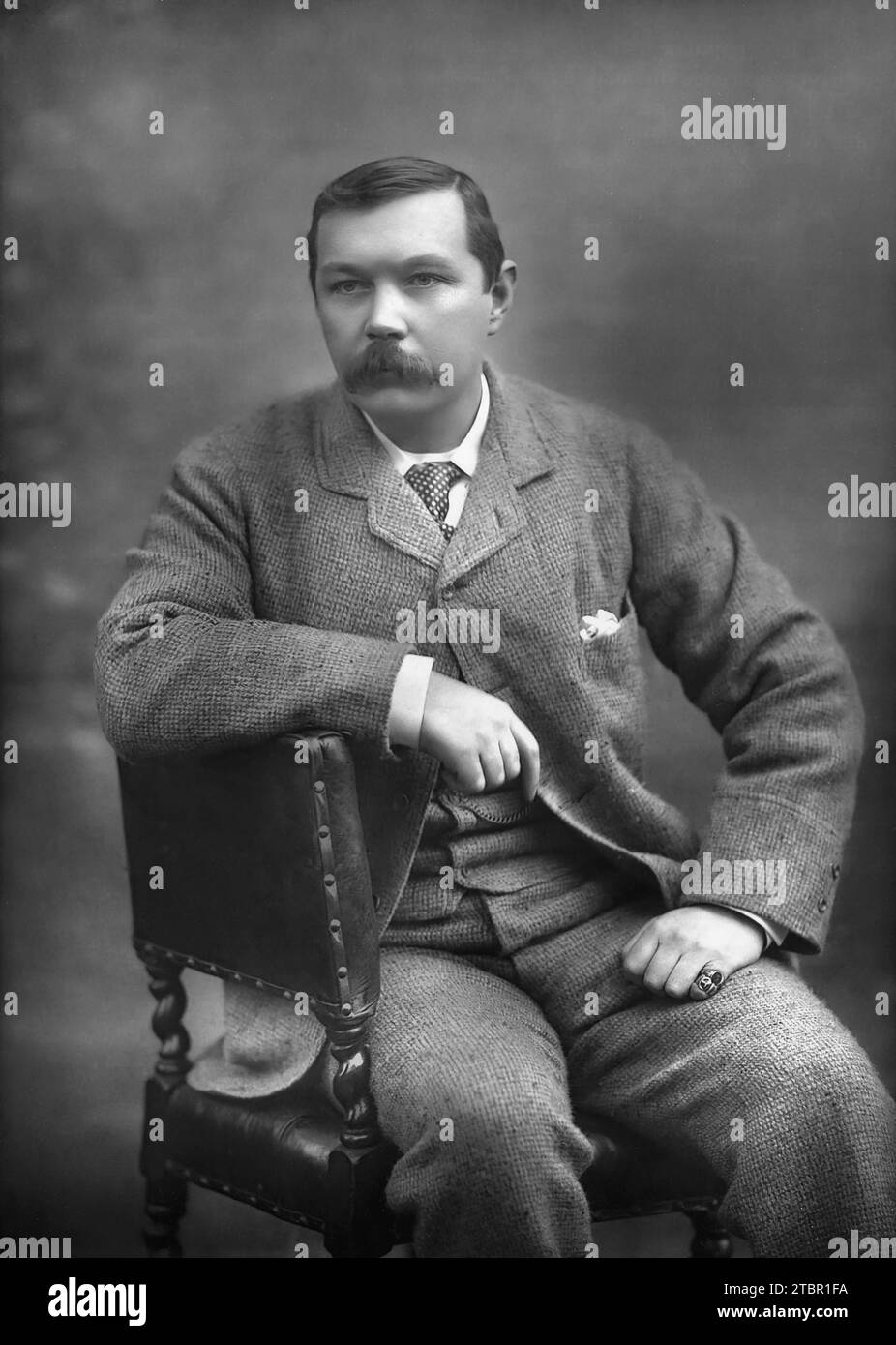 Sir Arthur Conan Doyle by the English photographer Herbert Rose Barraud. Carbon print on card mount. Year: 1893. Stock Photo