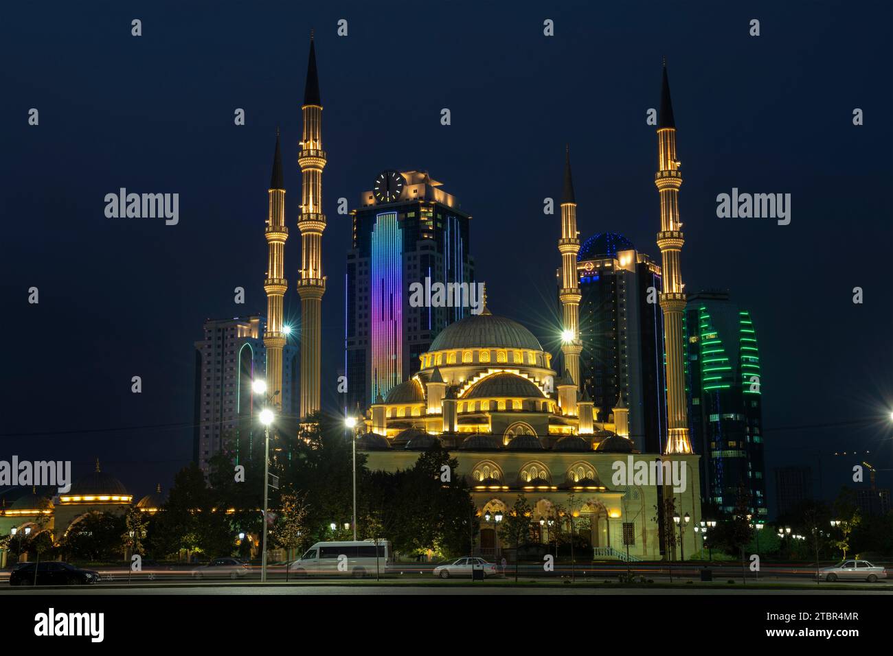 GROZNY, RUSSIA - SEPTEMBER 29, 2021: The Heart of Chechnya Mosque against the background of the Grozny City complex on September night Stock Photo