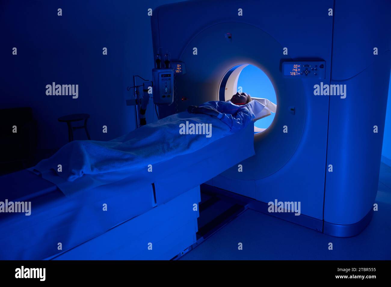 Client is undergoing computed tomography scanning of thorax Stock Photo
