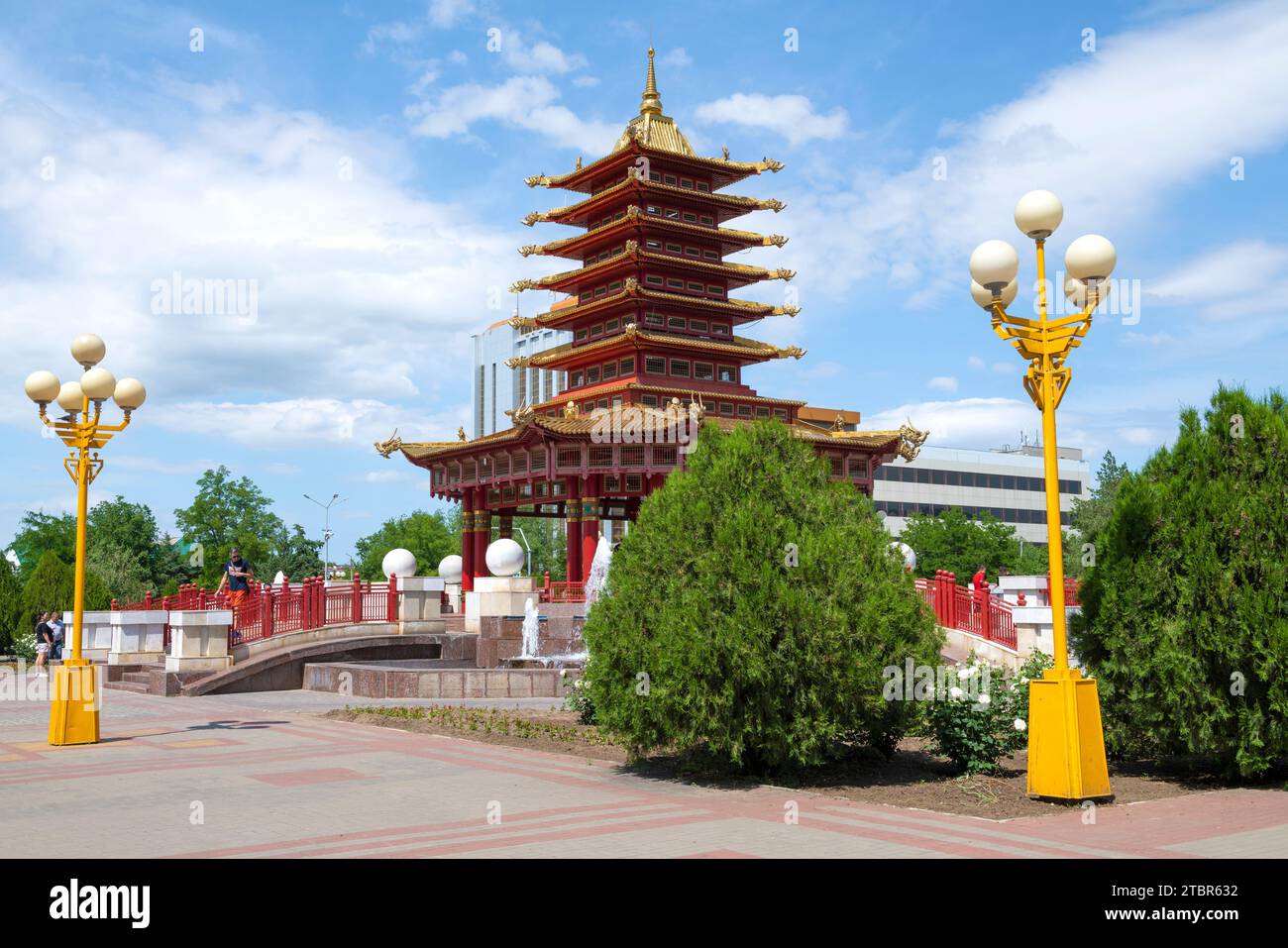 ELISTA, RUSSIA - JUNE 04, 2023: Buddhist pagoda 'Seven Days' in the cityscape on a sunny June day Stock Photo