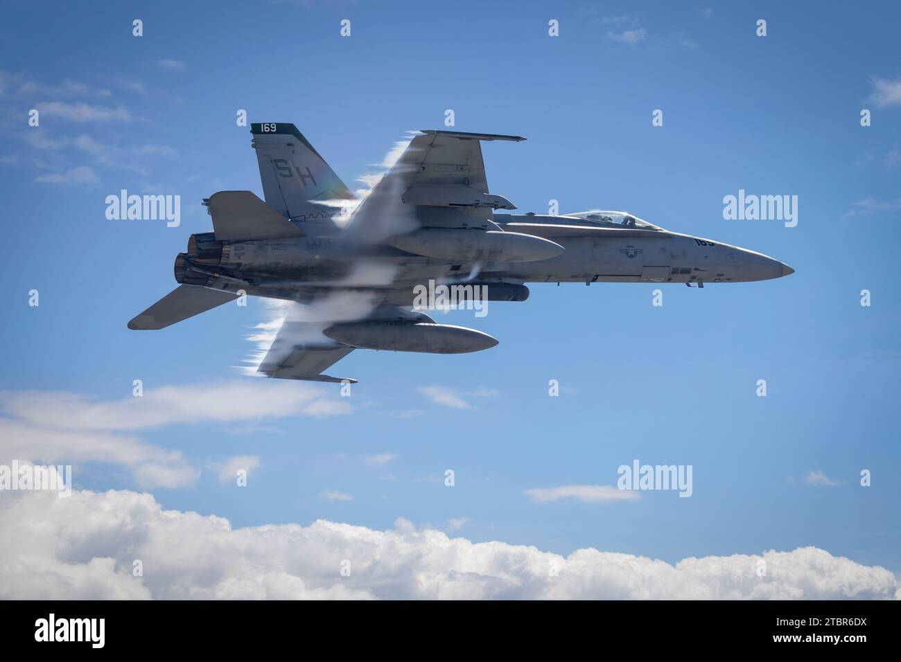 A US Marine F-18 Hornet of the Marine Air Ground Task Force (MAGTF), with vapor break around the aircraft, at America's Airshow 2023 in Miramar, Calif Stock Photo