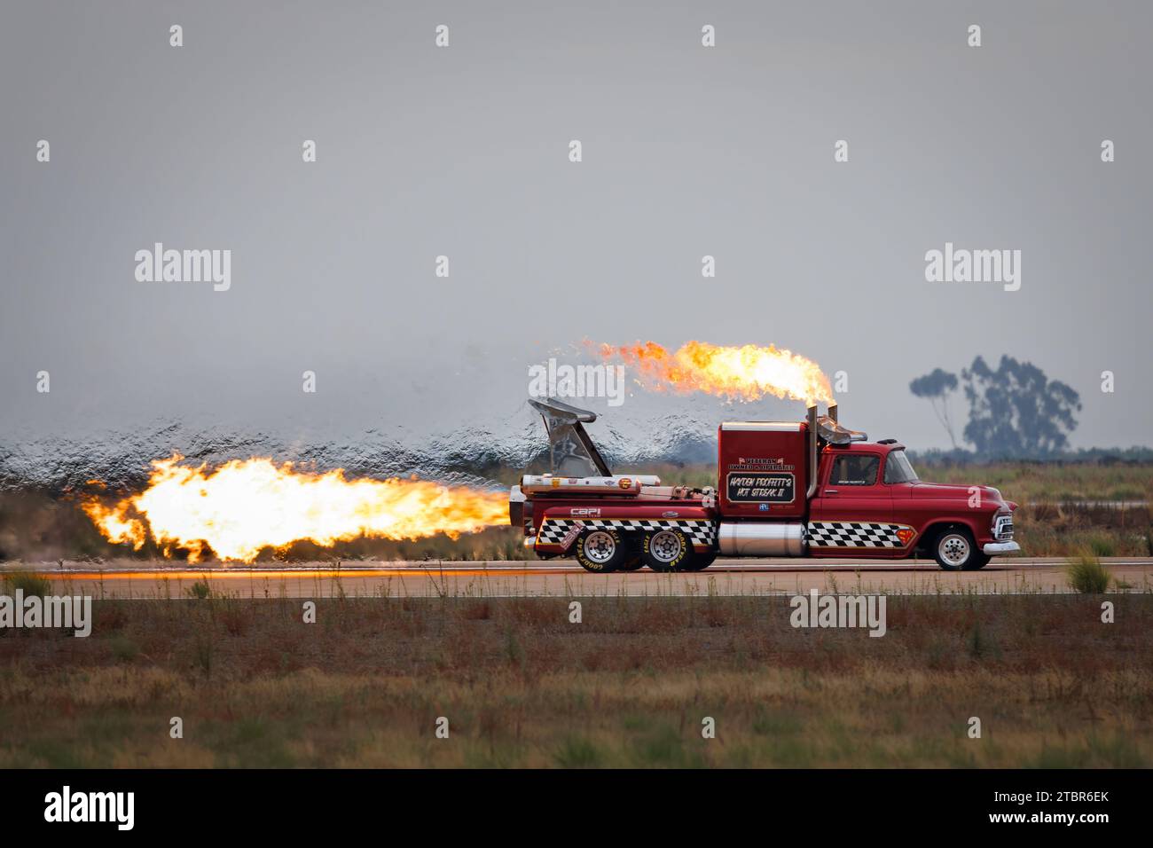 The Hot Streak II, twin jet engine 1957 Chevy Pickup, lights up the runway at America's Airshow 2023 in Miramar, California. Stock Photo