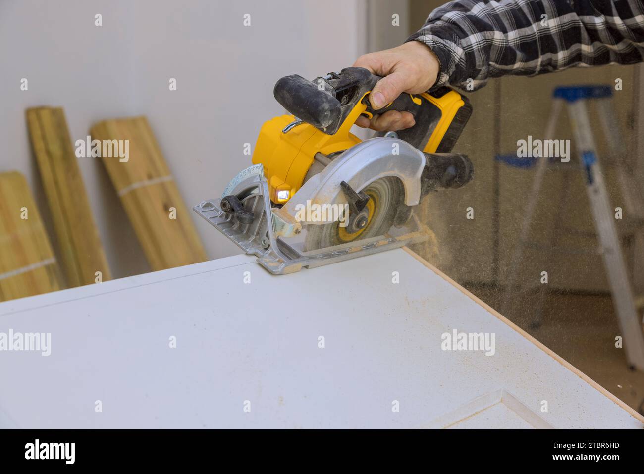 Using manual circular saw, interior doors must be cut to required size