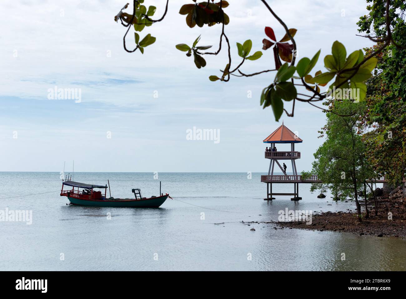 Viewing platform with fishing boat on the left in Kep, Cambodia Stock Photo