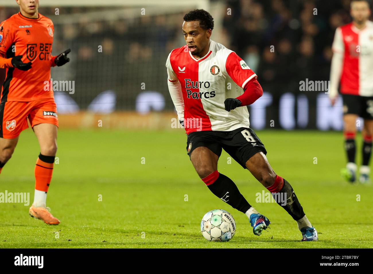 Quinten Timber of Feyenoord runs with the ball during the Dutch Eredivisie match between Feyenoord and FC Volendam on December 7, 2023 in Rotterdam, Netherlands Stock Photo