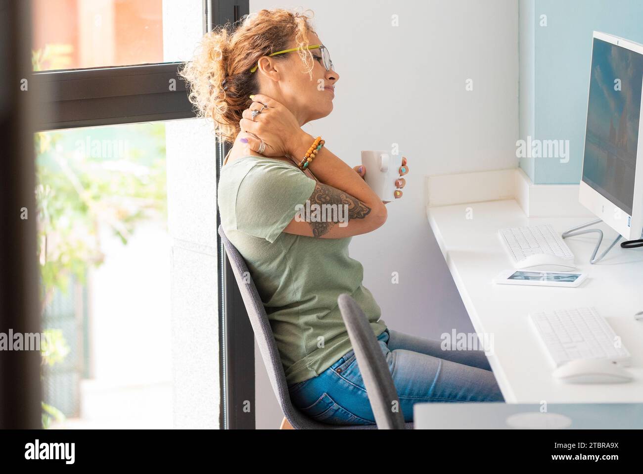 Overwork concept job with desktop computer at office. One adult woman