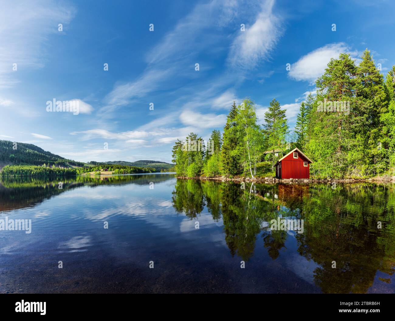 Red house in nature hi-res stock photography and images - Alamy