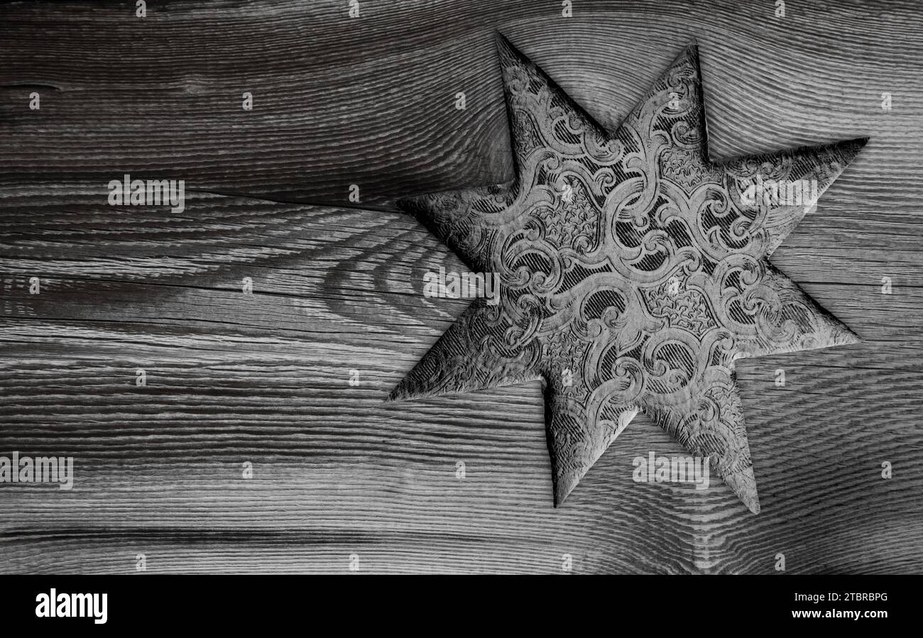 Christmas star on a wooden background Stock Photo