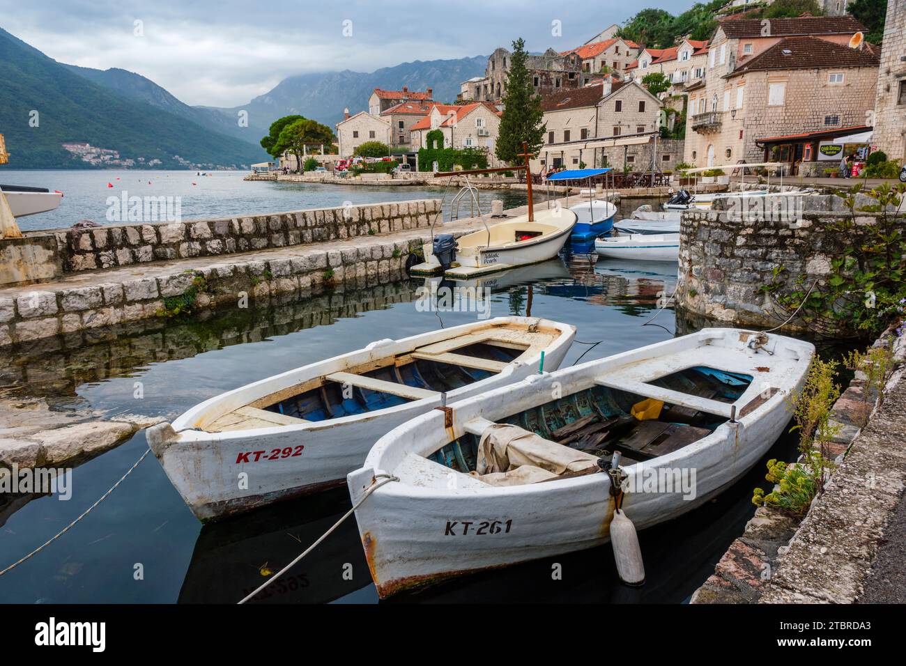 Boats in the little harbour at Perast, Bay of Kotor, Montenegro Stock Photo