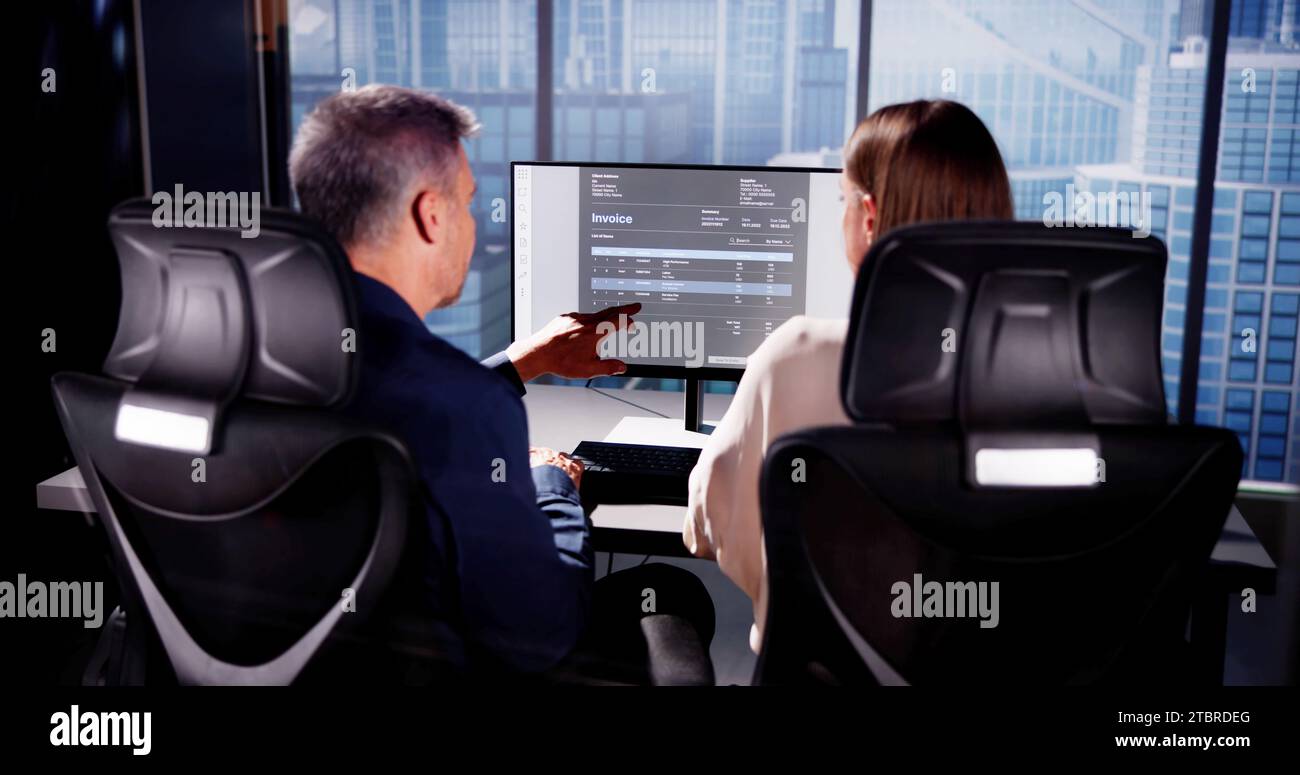 Accountant Checking Invoice for Online Payment with People Stock Photo
