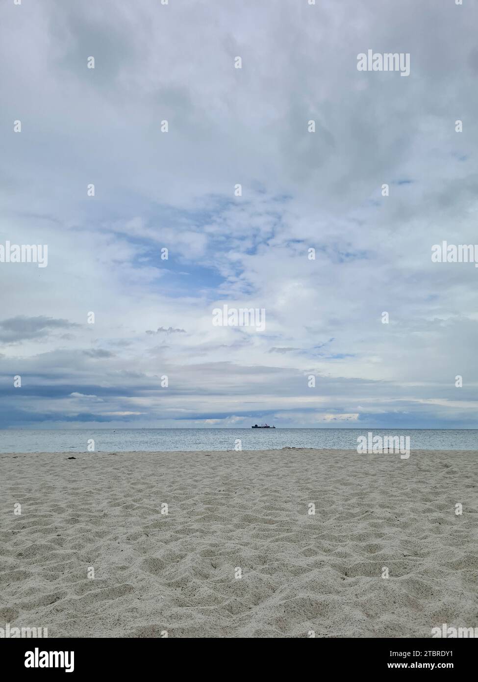 Germany, Mecklenburg-Western Pomerania, peninsula Fischland-Darß-Zingst, sky with clouds on sandy beach Prerow Stock Photo