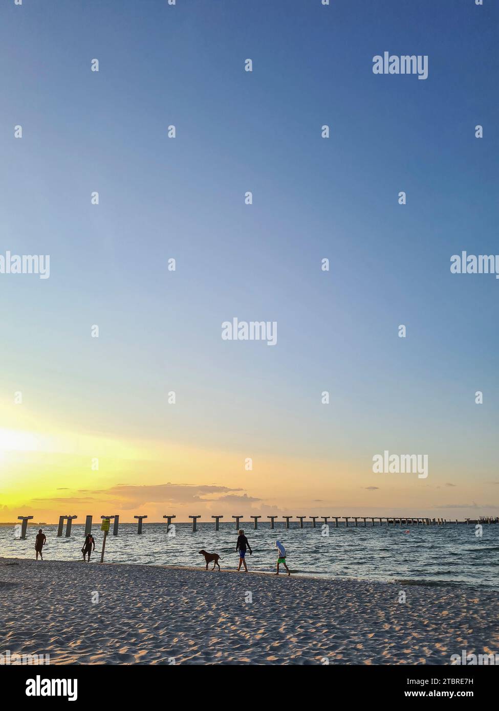 Sunset on the Baltic Sea coast in the resort of Prerow on the Fischland-Darß-Zingst peninsula, concrete pillars of the new pier (completion is planned for the 2024 season), Mecklenburg-Western Pomerania, Germany Stock Photo