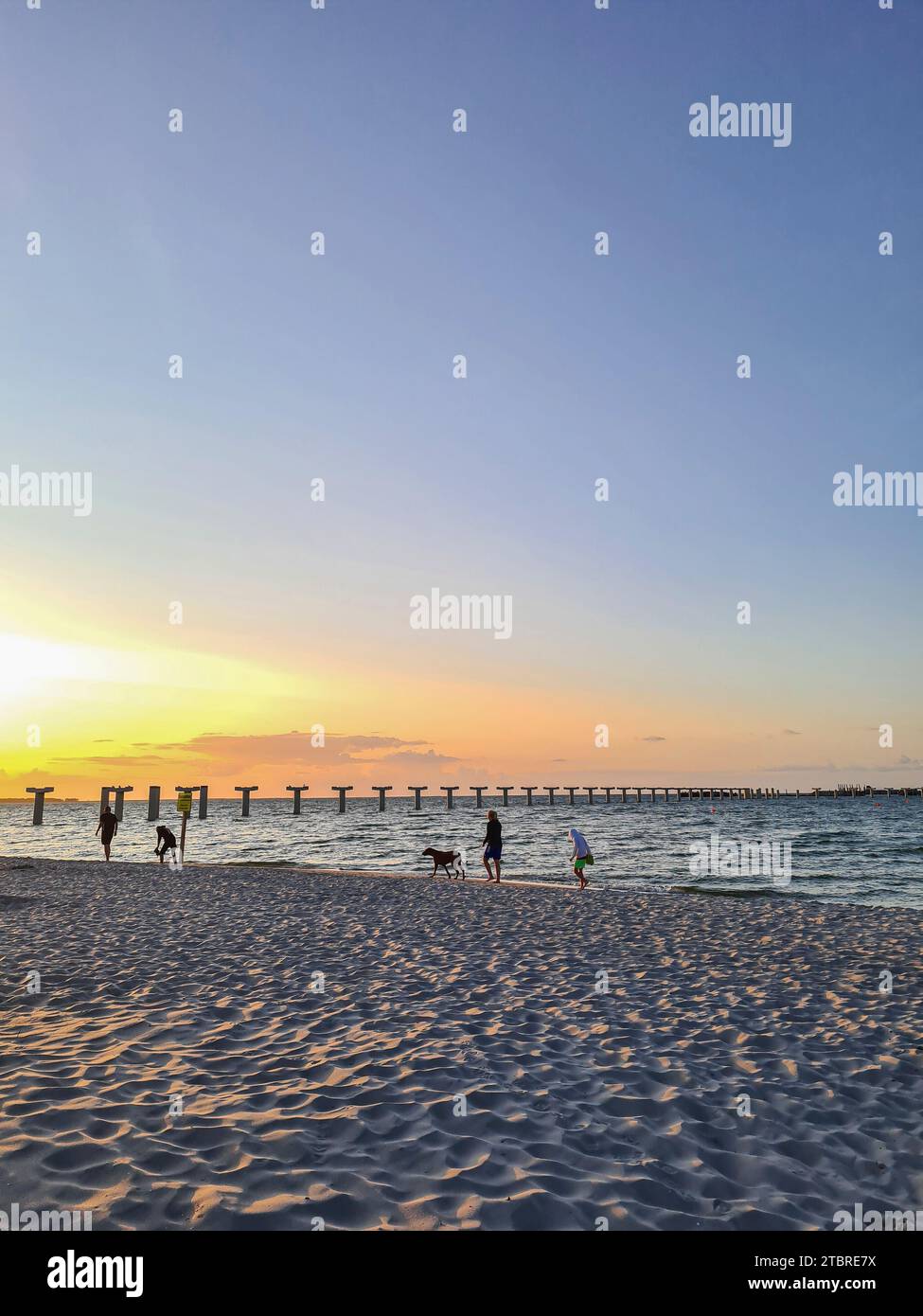 Sunset on the Baltic Sea coast in the resort of Prerow on the Fischland-Darß-Zingst peninsula, concrete pillars of the new pier (completion is planned for the 2024 season), Mecklenburg-Western Pomerania, Germany Stock Photo