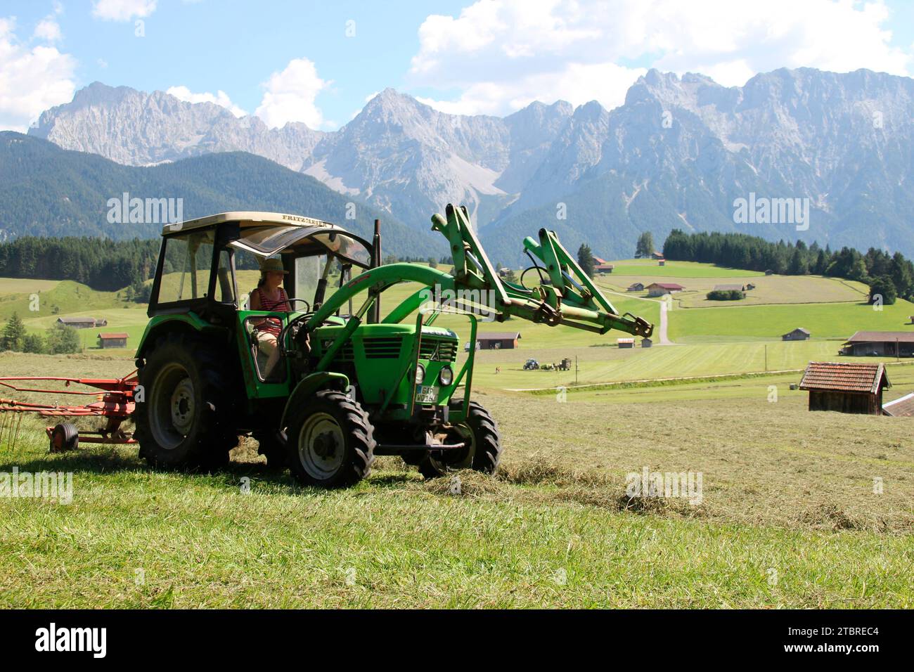 Deutz D 4506 tractor with rotary rake, engine capacity 2808 cc, 40 hp, year of construction 1980, haymaking, Germany, Bavaria, Upper Bavaria, Werdenfe Stock Photo