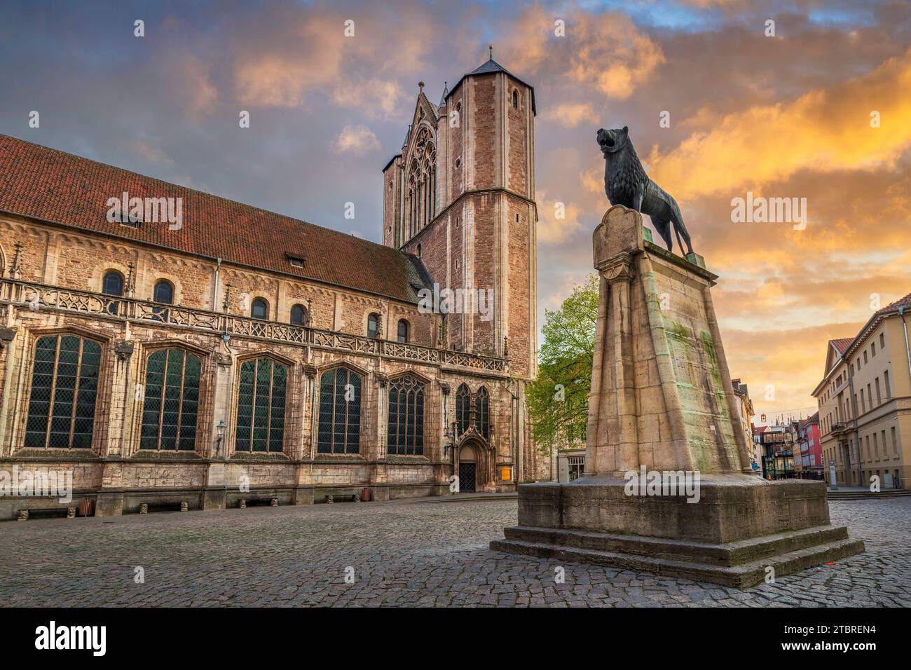 Statue of Lion and Cathedral in Braunschweig, Germany Stock Photo