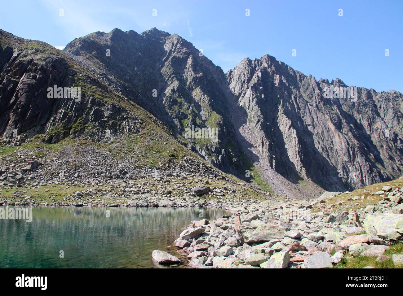View over the Hundstaller See (2289m), in the immediate vicinity of the Apollon Temple, hiking tour near Inzing, Innsbruck Land, Stubai Alps, Tyrol, A Stock Photo